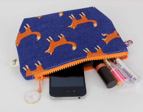 Little Zip; cosmetic pouch; cosmetic; cosmetic bag; water repllent; fox; fox print; zipper pouch; wristlet; made in usa; navy; Pouch; small;