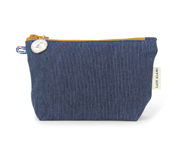 Little Zip; cosmetic pouch; cosmetic; cosmetic bag; water repllent; denim; zipper pouch; wristlet; made in usa; blue; stitch; Little; Pouch;