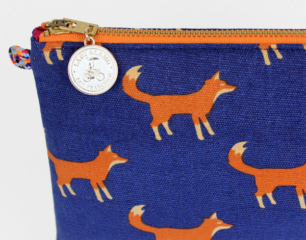 Miss Zip; cosmetic pouch; cosmetic; cosmetic bag; water repllent; fox; fox print; zipper pouch; wristlet; made in usa; navy; clutch; clutch purse; Pouch;